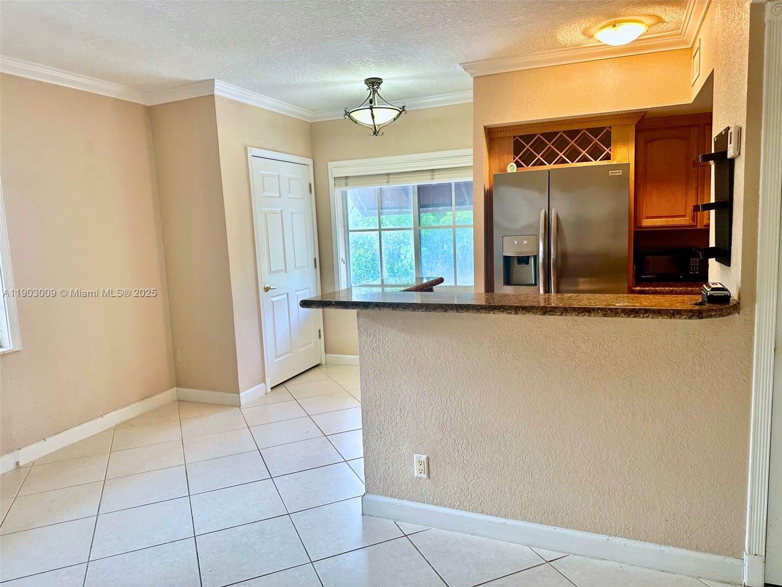 924 Southeast 2nd Street, Unit 9 Fort Lauderdale, FL 33301 - Photo 6 of 19 an entryway with a window