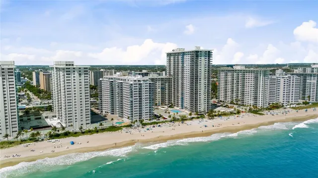 a view of a city with tall buildings