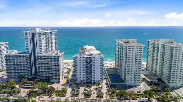 a view of a city with tall buildings