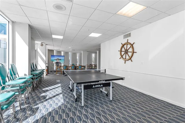 a view of a living room and dining room