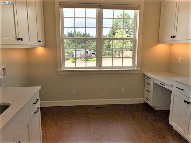 19763 Parrish Road Oregon City, OR 97045 - Photo 21 of 28 a view of a storage and utility room with a window