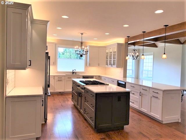 19763 Parrish Road Oregon City, OR 97045 - Photo 5 of 28 a kitchen with a stove and a refrigerator