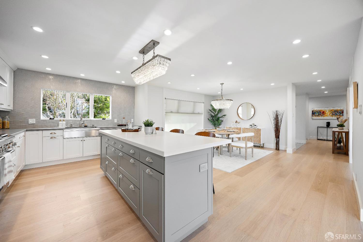 1270 Roble Road Millbrae, CA 94030 - Photo 27 of 61 a kitchen with a sink stove and cabinets