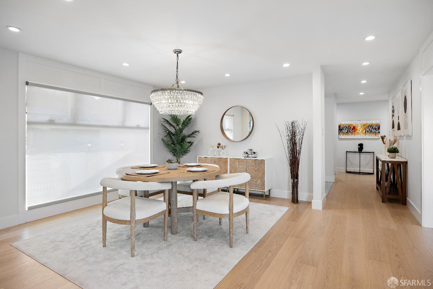 1270 Roble Road Millbrae, CA 94030 - Photo 28 of 61 a view of a dining room and livingroom with furniture wooden floor a chandelier