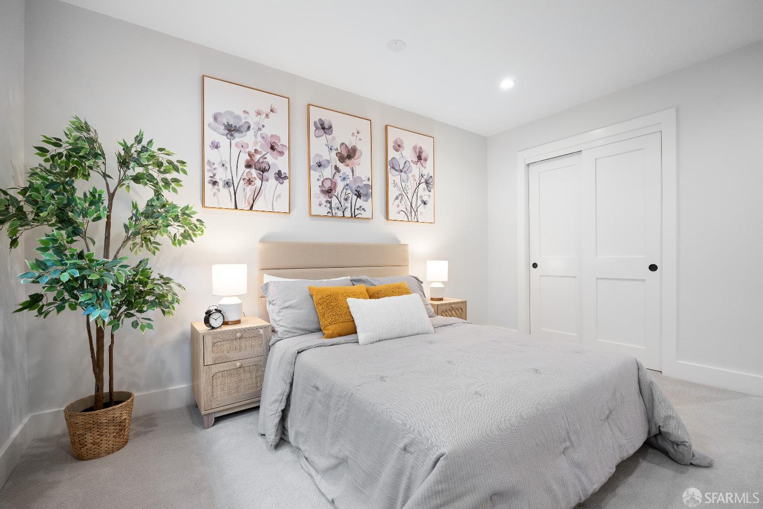 1270 Roble Road Millbrae, CA 94030 - Photo 37 of 61 a bedroom with a bed and a potted plant