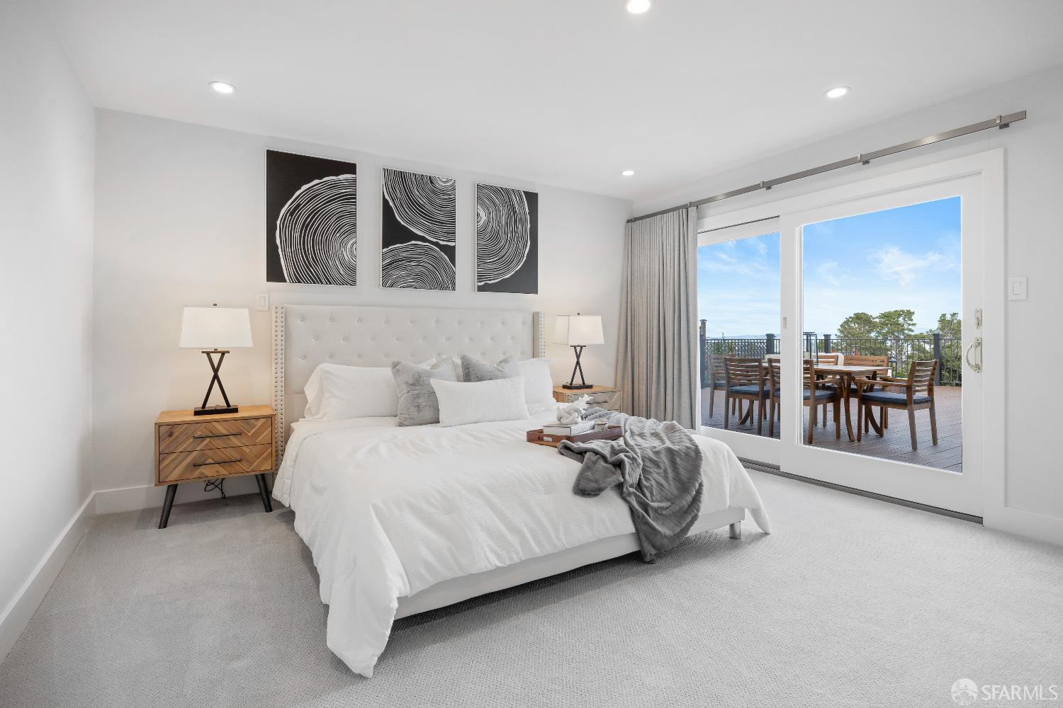 1270 Roble Road Millbrae, CA 94030 - Photo 42 of 61 a spacious bedroom with a bed and a large window