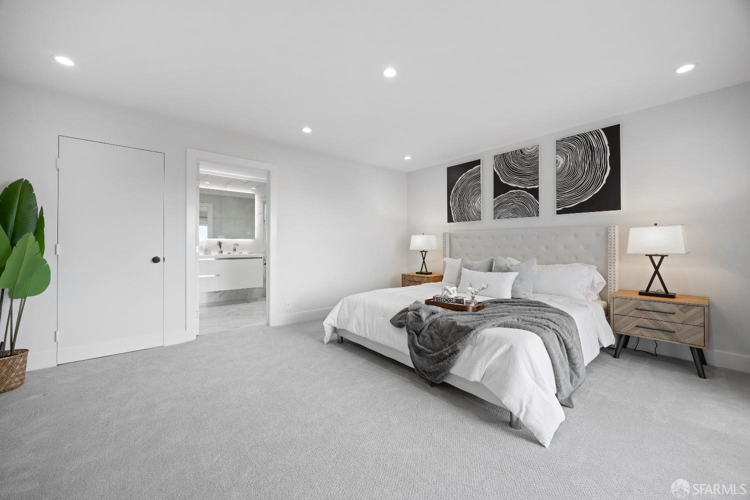 1270 Roble Road Millbrae, CA 94030 - Photo 43 of 61 a spacious bedroom with a bed and a chandelier