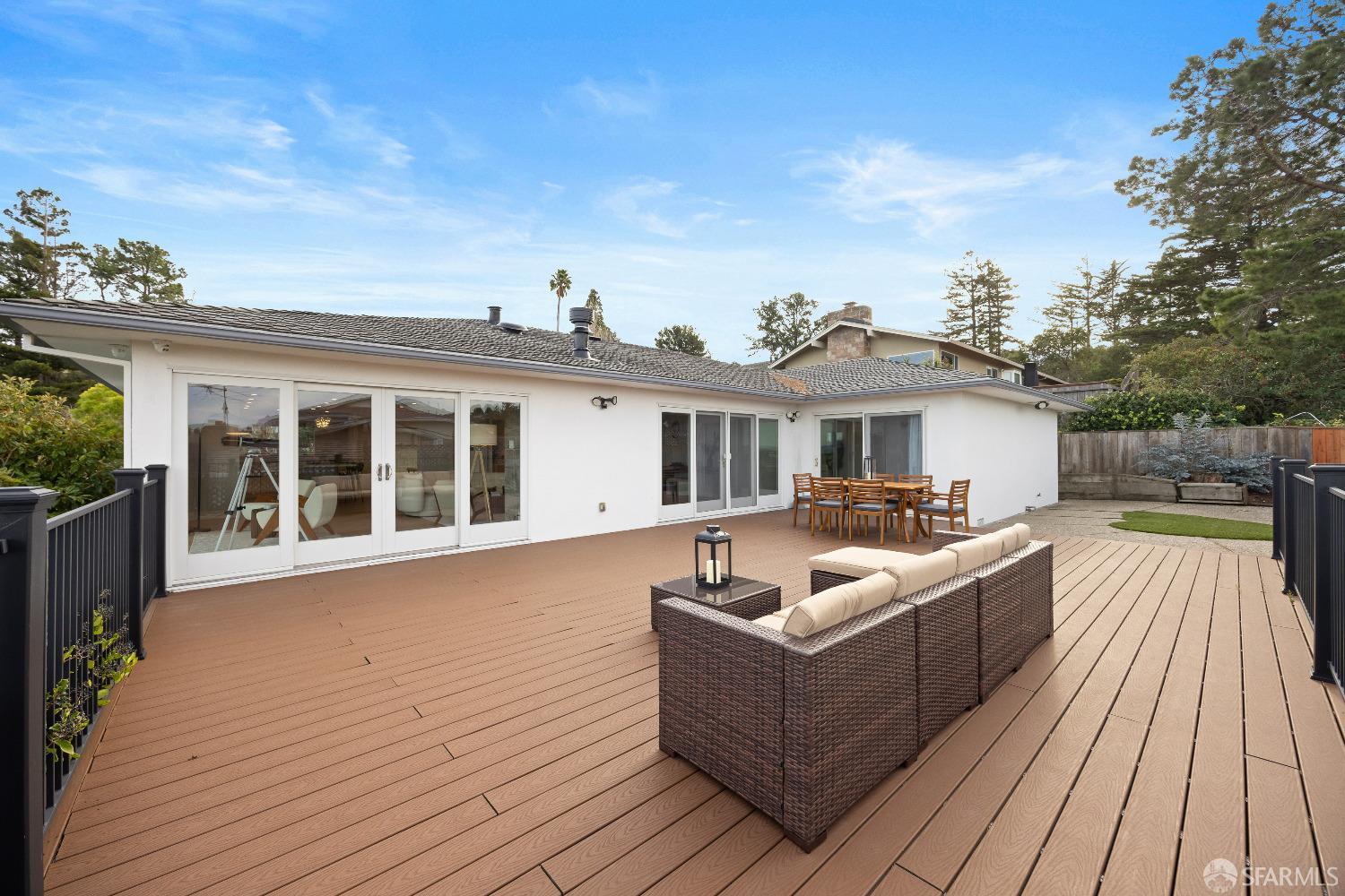 1270 Roble Road Millbrae, CA 94030 - Photo 53 of 61 a view of a house with couches wooden floor and barbeque oven