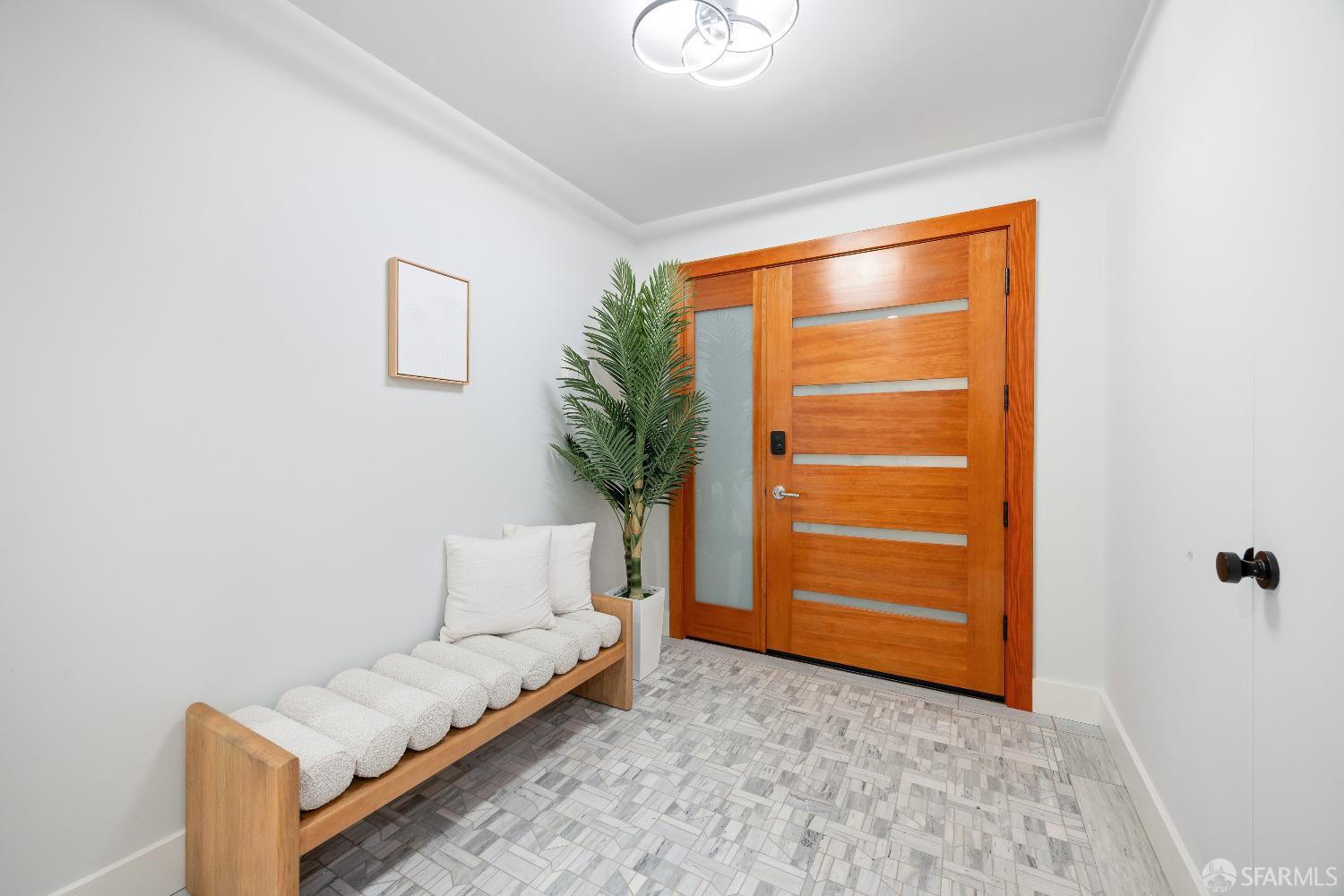 1270 Roble Road Millbrae, CA 94030 - Photo 6 of 61 a living room with a bed and a dresser