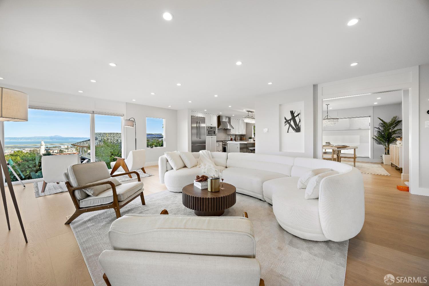 1270 Roble Road Millbrae, CA 94030 - Photo 7 of 61 a living room with furniture white walls and a view of kitchen