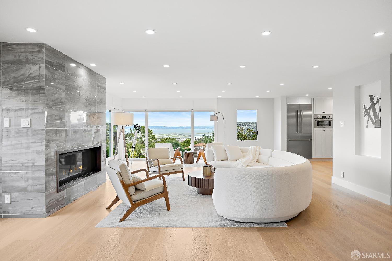 1270 Roble Road Millbrae, CA 94030 - Photo 9 of 61 a living room with fireplace furniture and a table