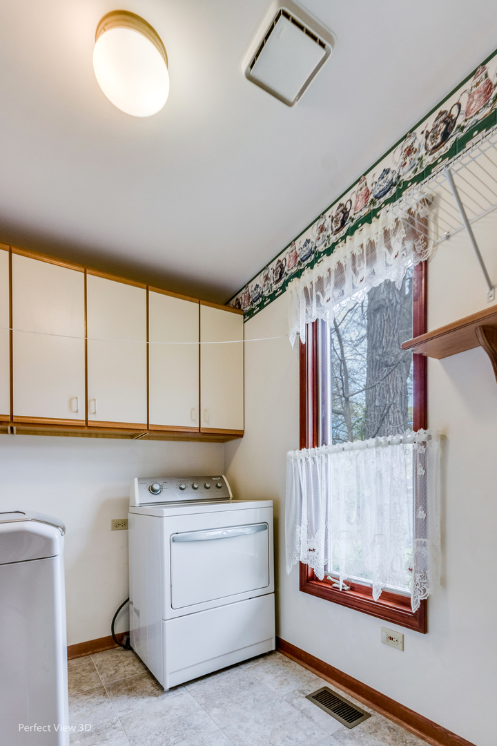 1 Genesee Court Bolingbrook, IL 60440 - Photo 12 of 29 a utility room with dryer and washer