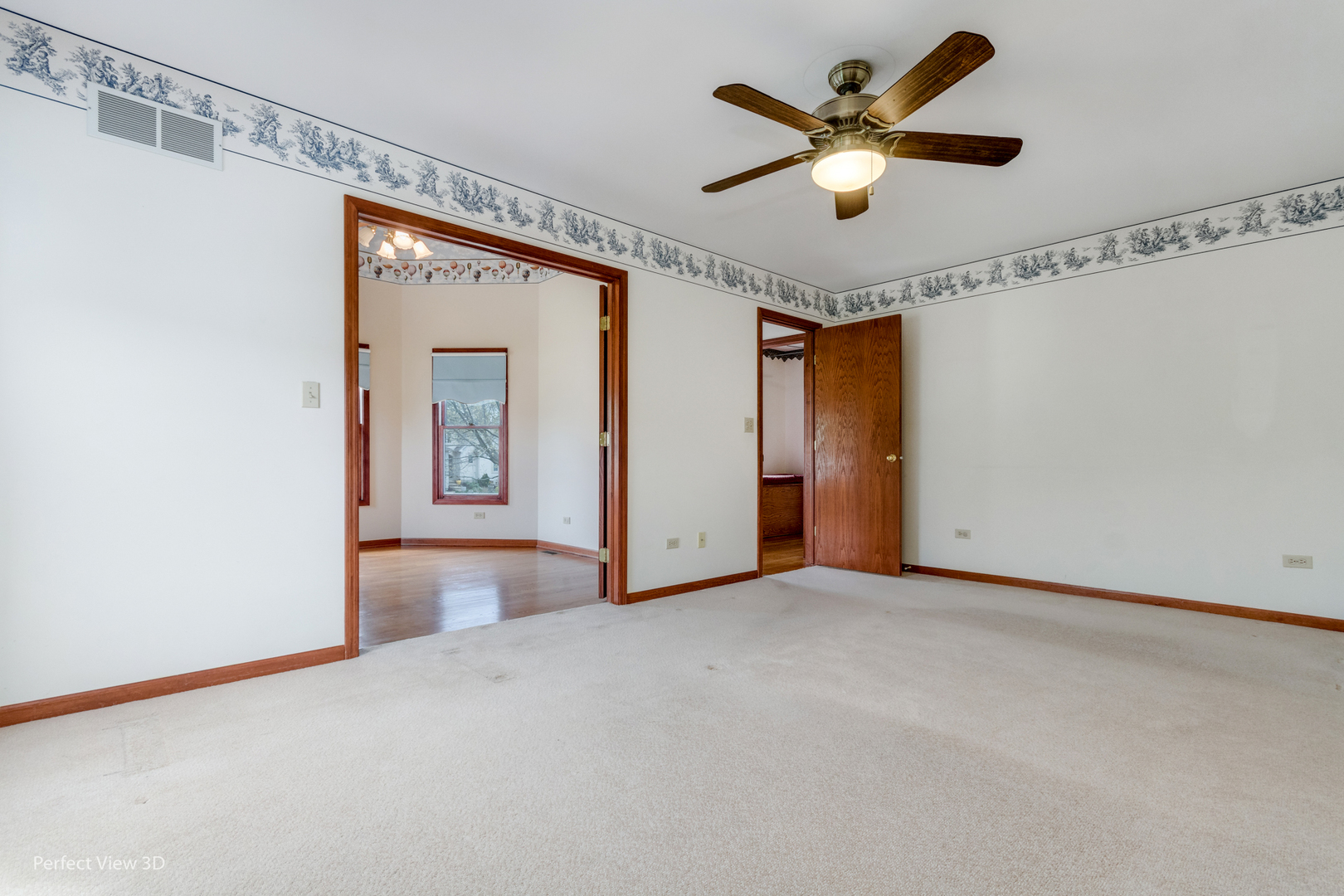 1 Genesee Court Bolingbrook, IL 60440 - Photo 19 of 29 a view of an empty room with a ceiling fan