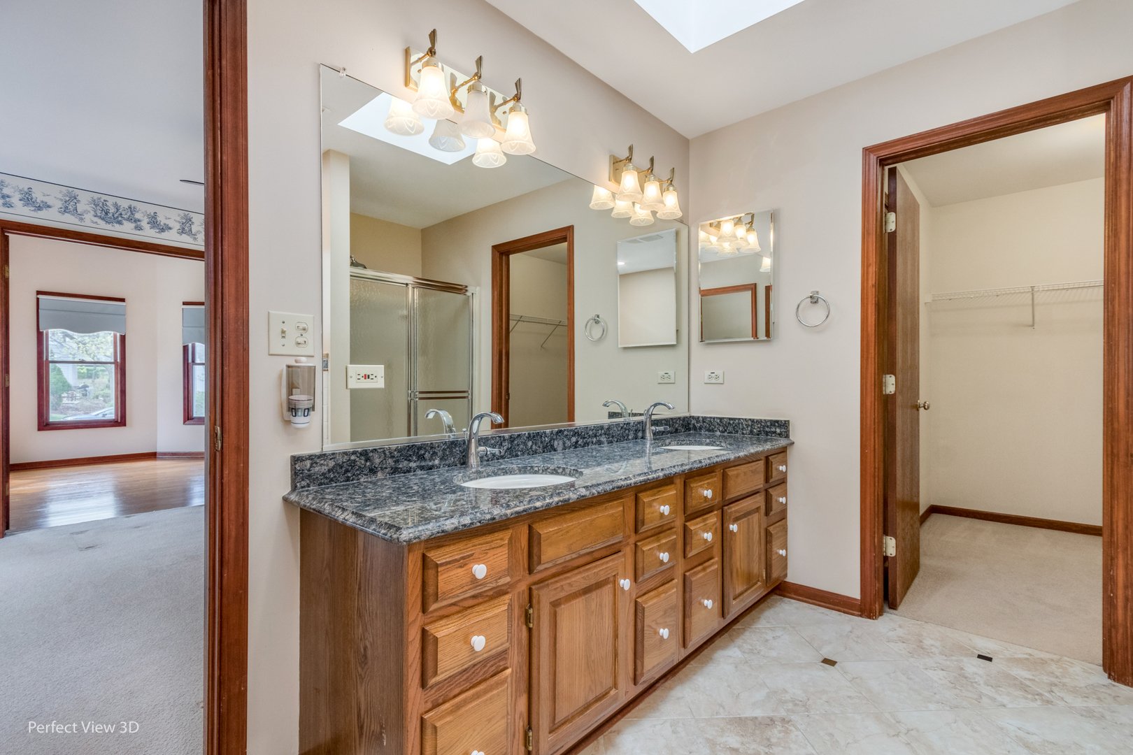 1 Genesee Court Bolingbrook, IL 60440 - Photo 21 of 29 a bathroom with a granite countertop sink and a mirror