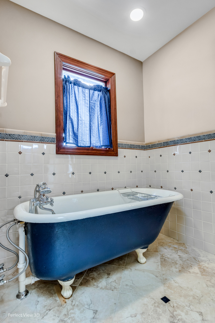 1 Genesee Court Bolingbrook, IL 60440 - Photo 22 of 29 a room with granite countertop cabinets and sink