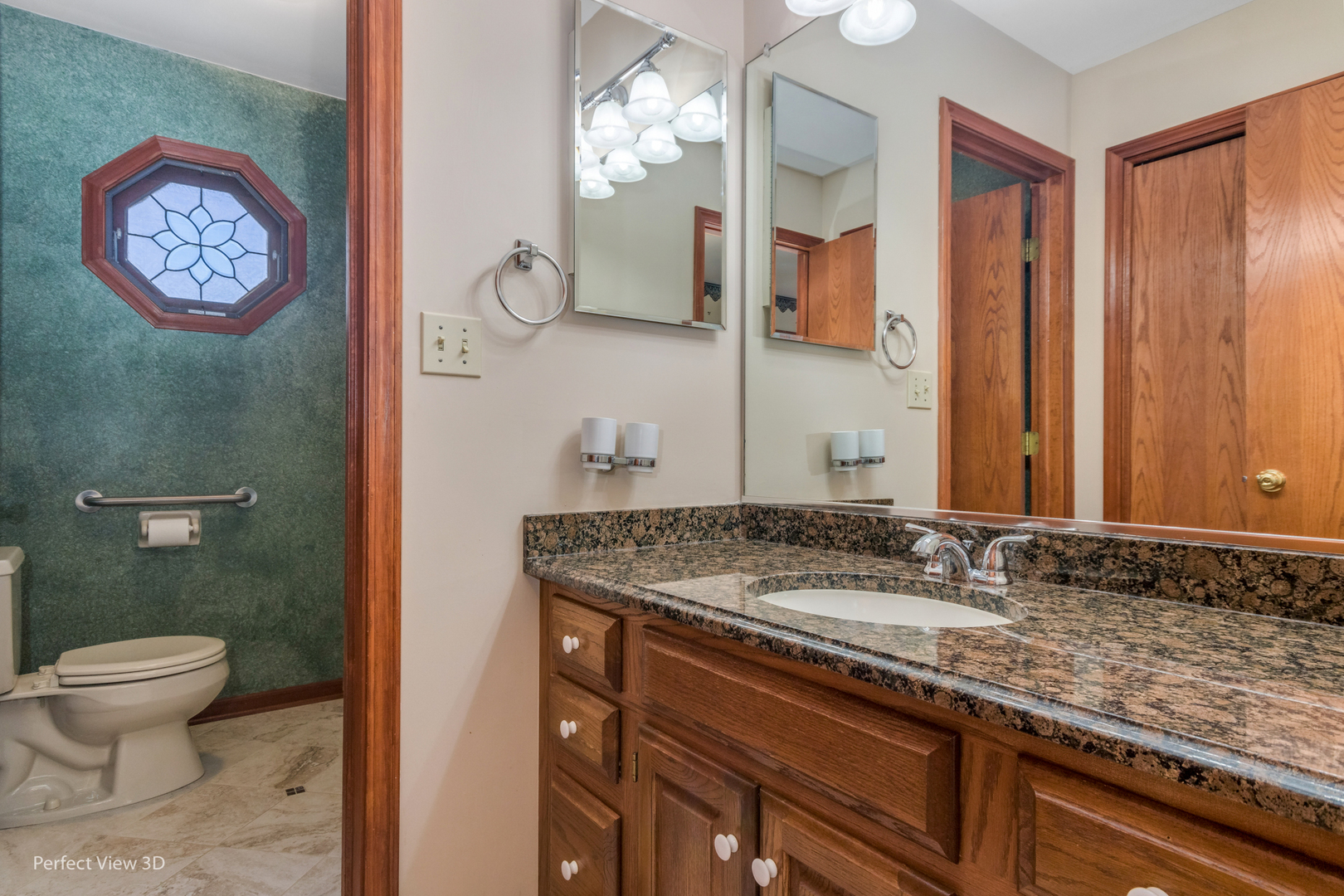 1 Genesee Court Bolingbrook, IL 60440 - Photo 25 of 29 a bathroom with a granite countertop sink and a mirror