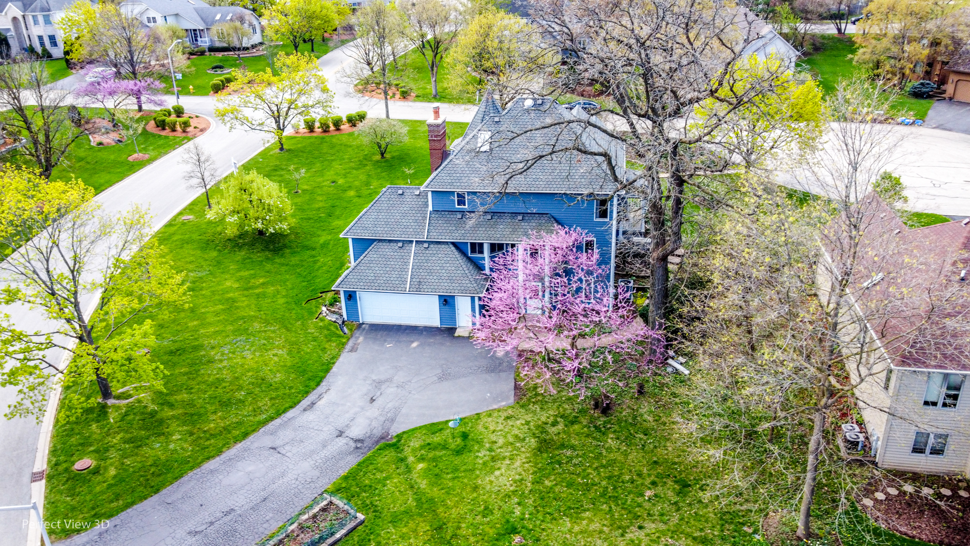 1 Genesee Court Bolingbrook, IL 60440 - Photo 4 of 29 a small yard with lots of green space and plants