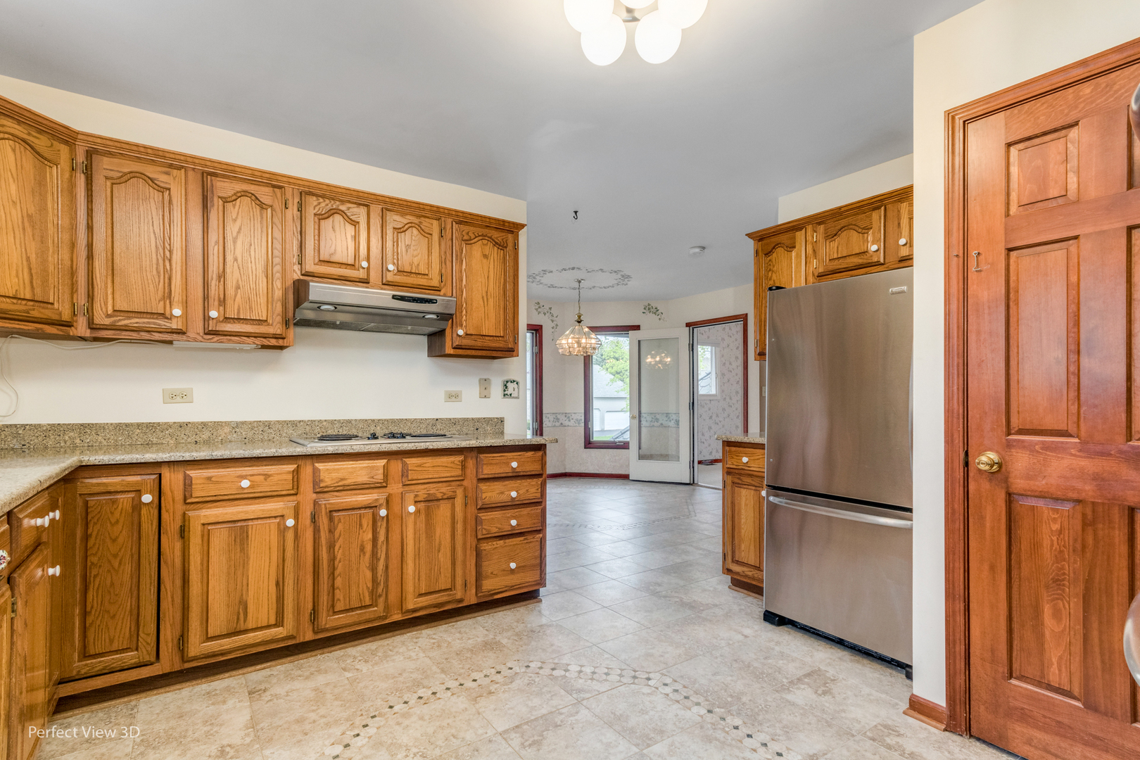 1 Genesee Court Bolingbrook, IL 60440 - Photo 10 of 29 a kitchen with stainless steel appliances granite countertop a refrigerator a sink and cabinets