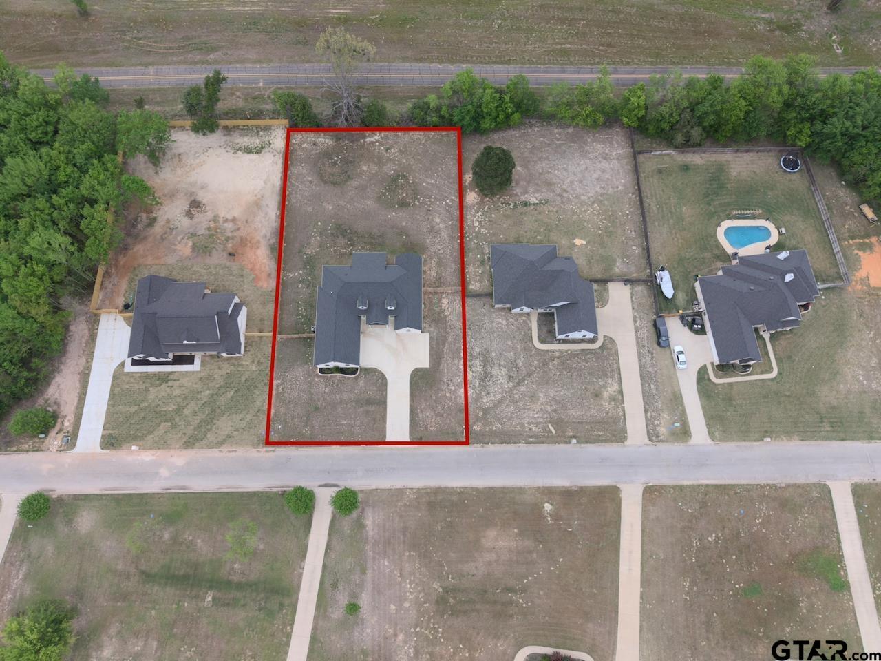 19383 Ridge Point Circle Lindale, TX 75771 - Photo 47 of 48 an aerial view of a house with a yard