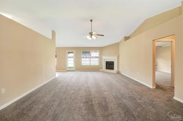 a view of livingroom with window and hardwood floor