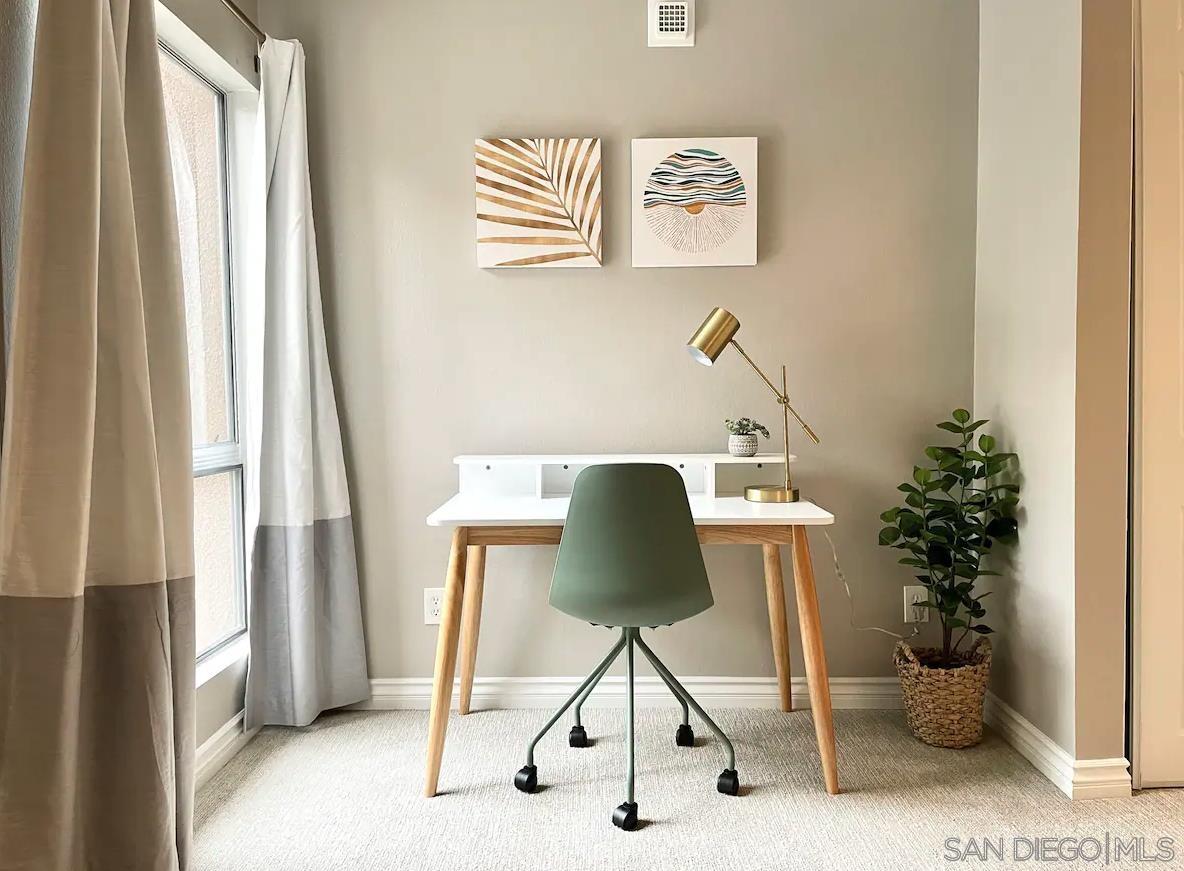 1621 Unit E 217, Unit E217 San Diego, CA 92108 - Photo 17 of 45 a workspace with furniture and a window