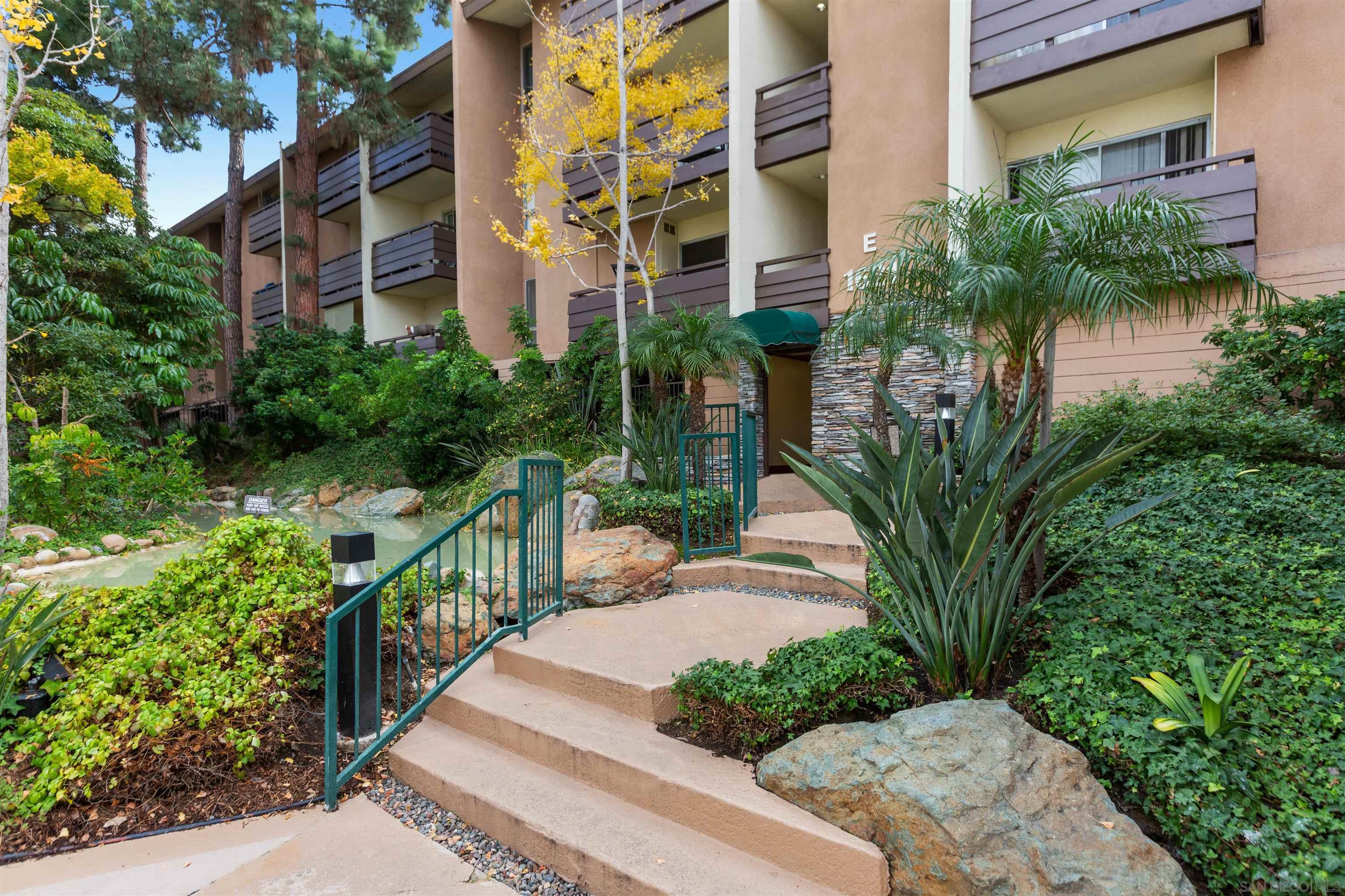 1621 Unit E 217, Unit E217 San Diego, CA 92108 - Photo 23 of 45 a view of a garden with pathway