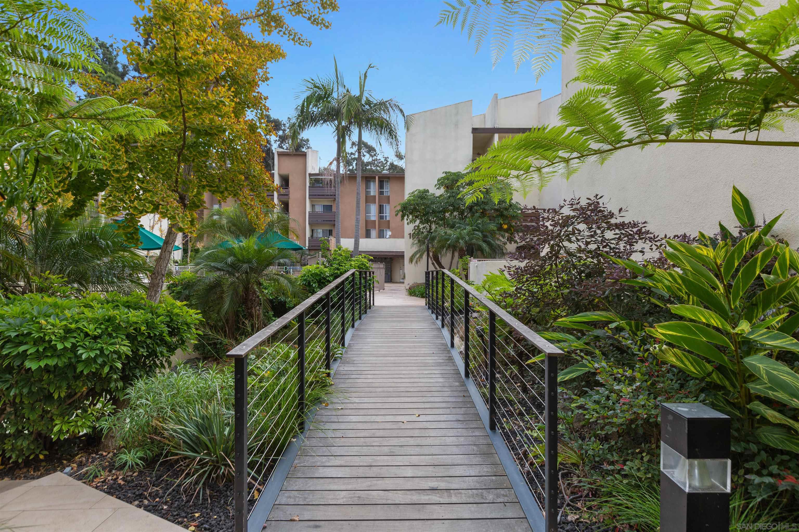 1621 Unit E 217, Unit E217 San Diego, CA 92108 - Photo 29 of 45 a view of a house with large windows