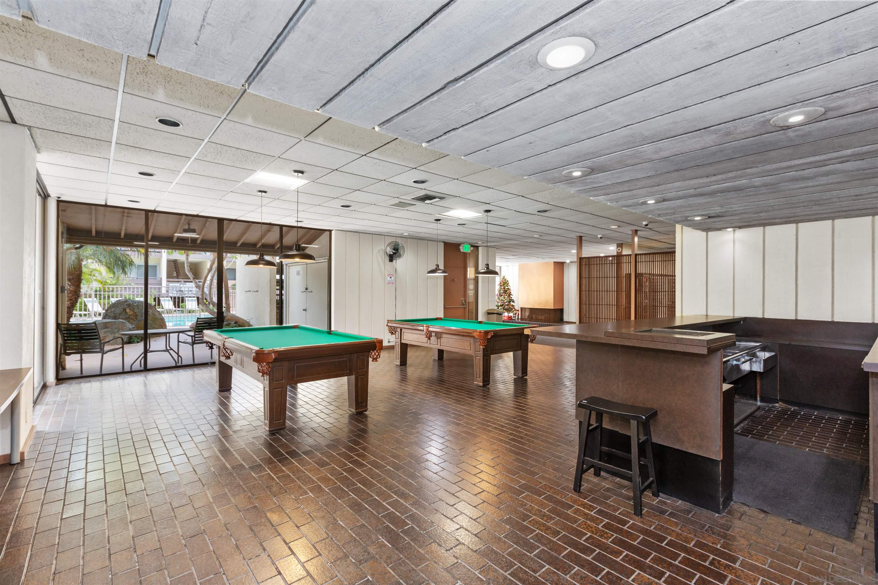 1621 Unit E 217, Unit E217 San Diego, CA 92108 - Photo 38 of 45 a lobby with furniture and wooden floor