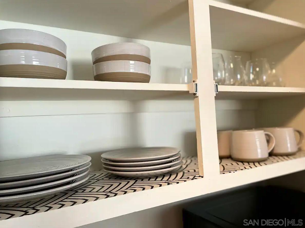 1621 Unit E 217, Unit E217 San Diego, CA 92108 - Photo 8 of 45 a bathroom with a sink and a mirror