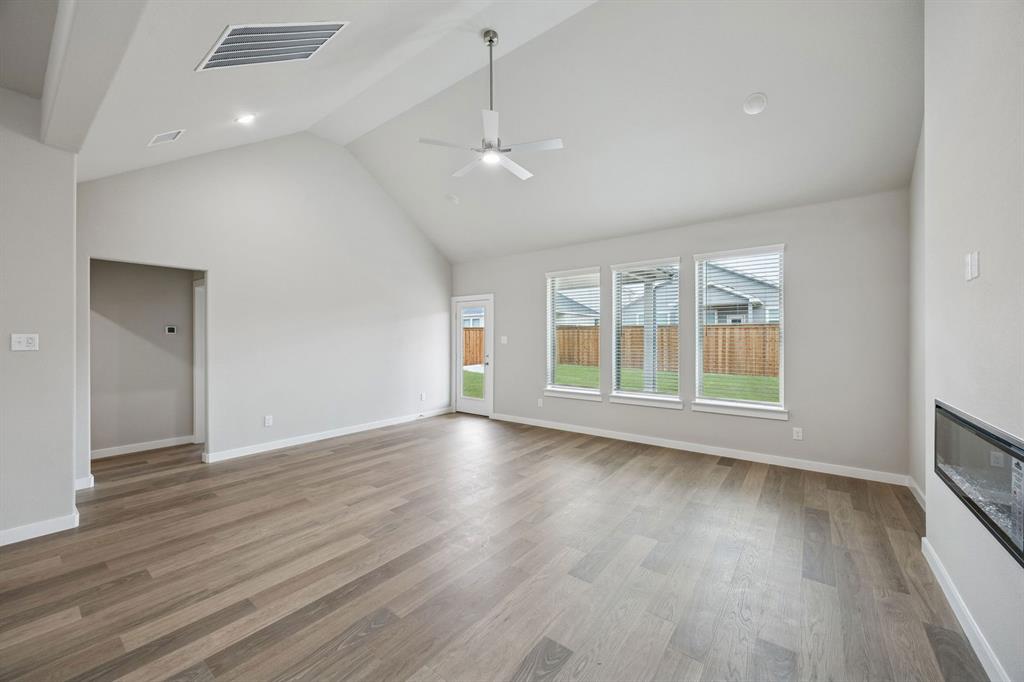 2109 Sunshining Road Princeton, TX 75407 - Photo 13 of 35 Living and Dining Rooms in the Stanley II home plan by Trophy Signature Homes – REPRESENTATIVE PH