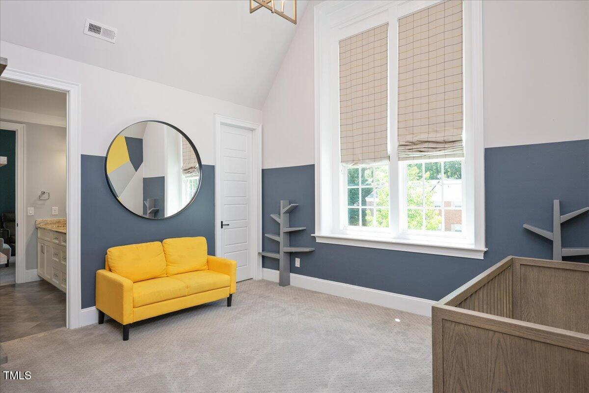 6502 New Market Way Raleigh, NC 27615 - Photo 37 of 54 a living room with furniture and a window