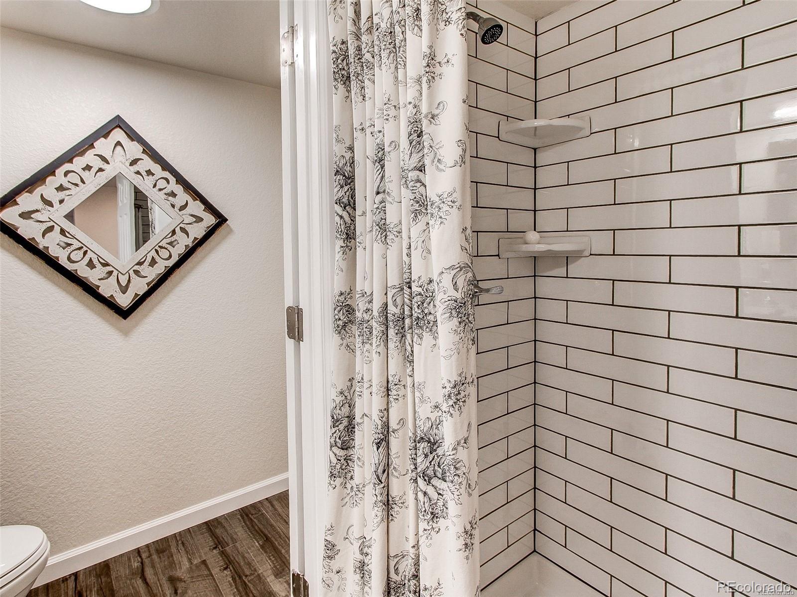 665 Juniper Street Golden, CO 80401 - Photo 26 of 44 a bathroom with a shower