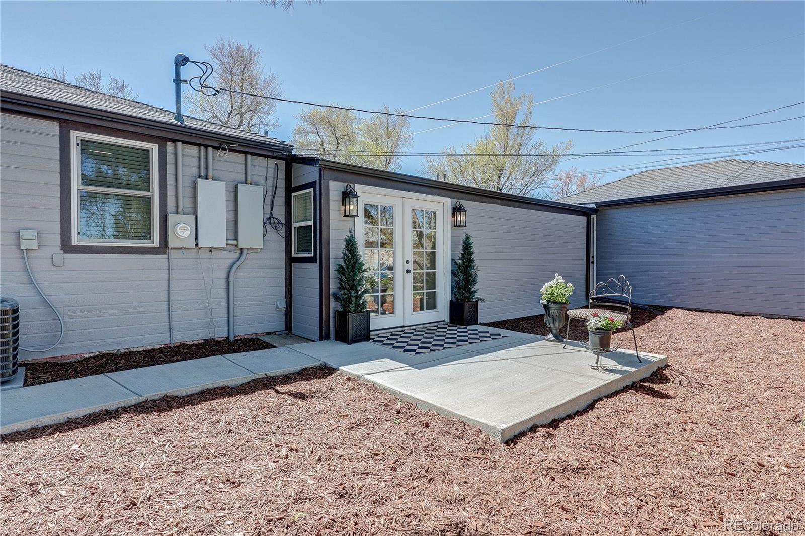 665 Juniper Street Golden, CO 80401 - Photo 42 of 44 a front view of a house with garden