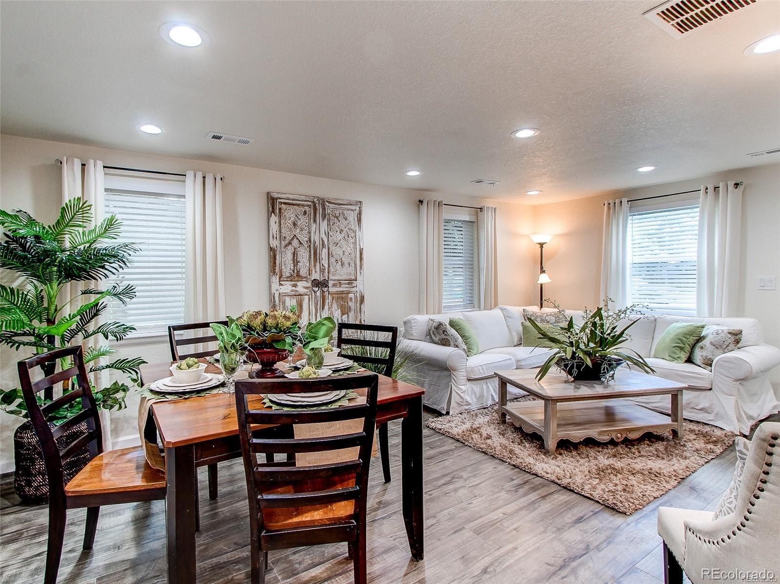 665 Juniper Street Golden, CO 80401 - Photo 6 of 44 a living room with furniture potted plant and window