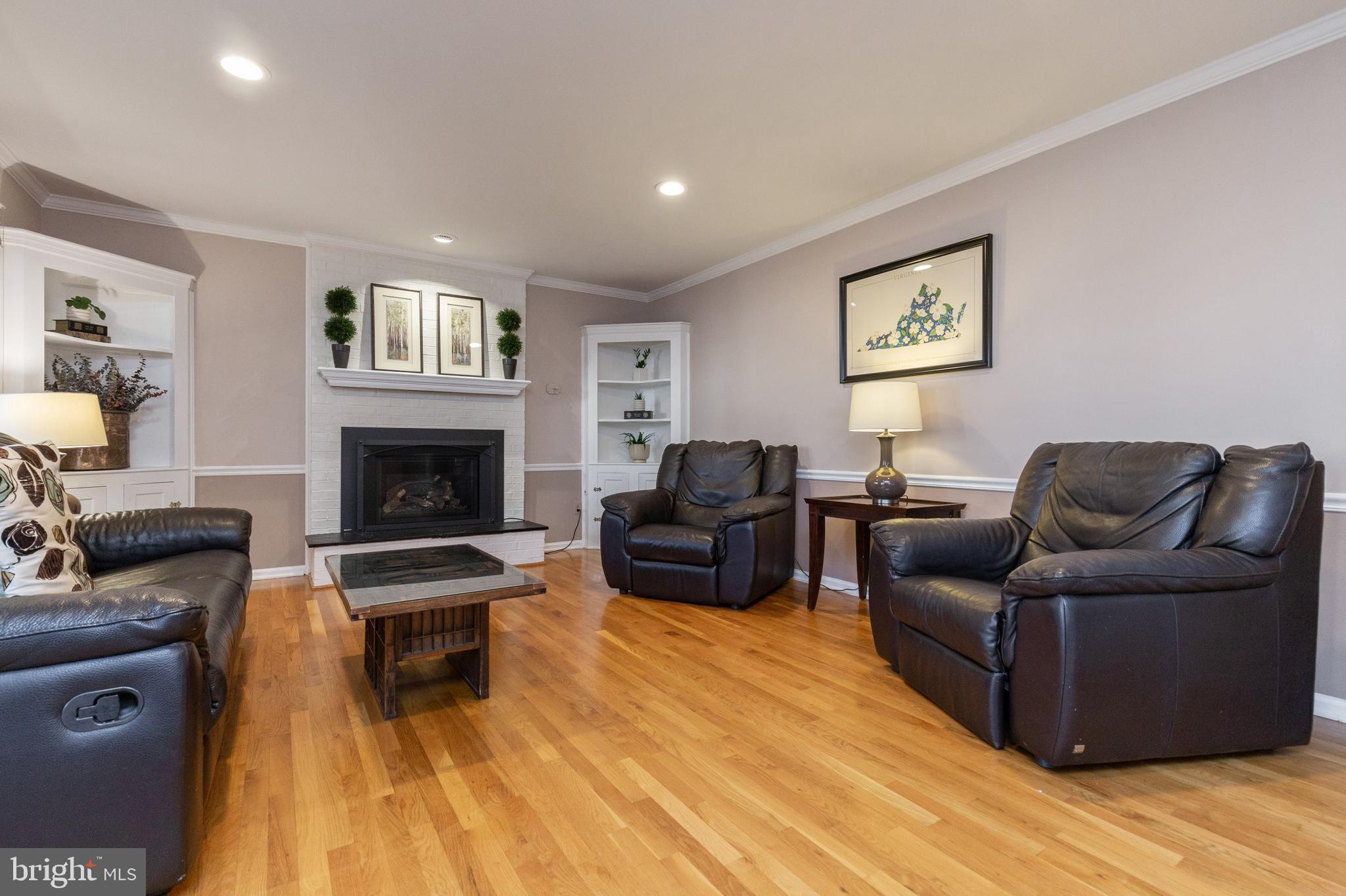 12332 Washington Brice Road Fairfax, VA 22033 - Photo 29 of 54 Family Room w/Built-In Cabinet to Left/Right of FP