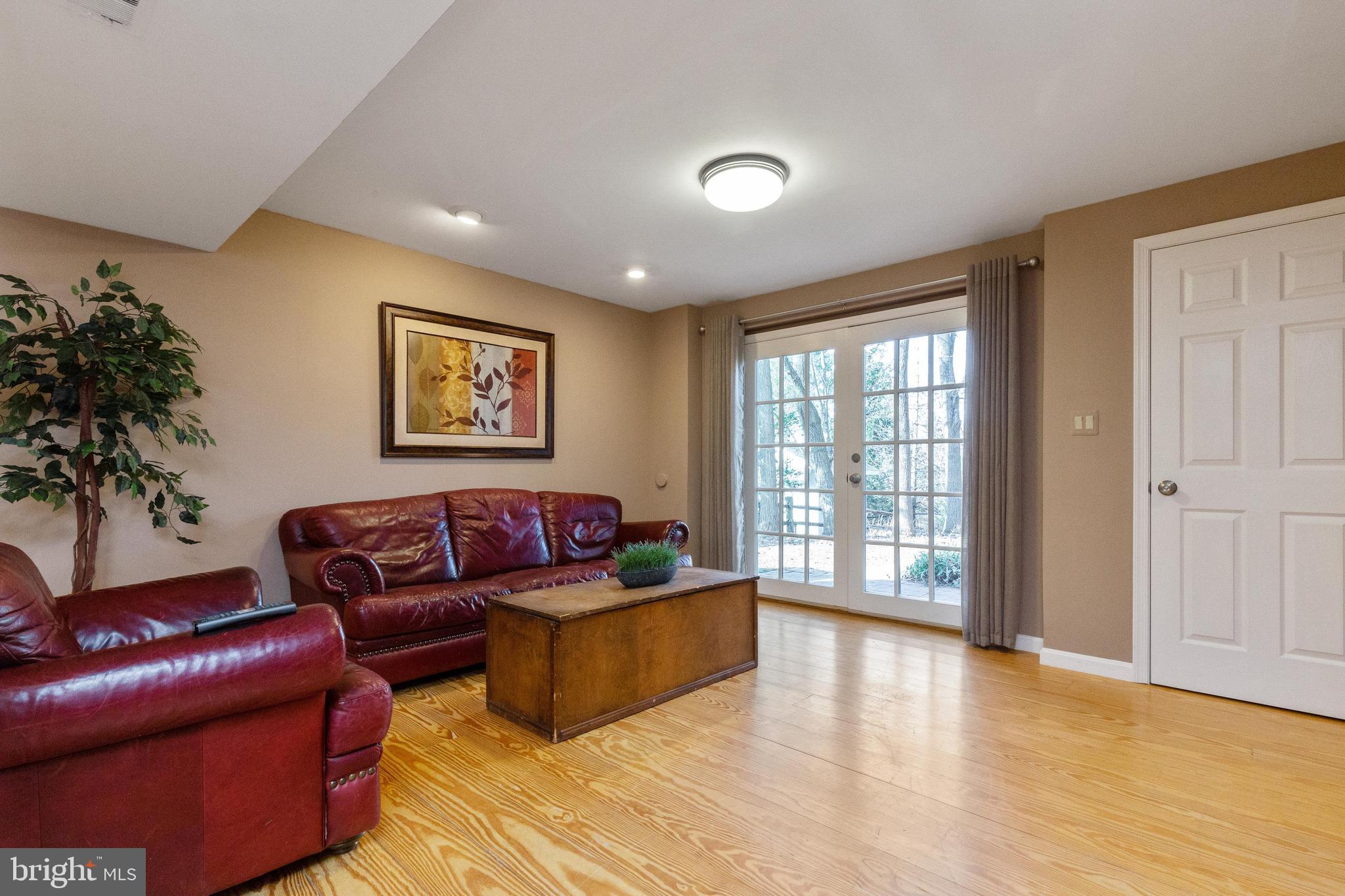 12332 Washington Brice Road Fairfax, VA 22033 - Photo 44 of 54 Basement Rec Room with French Doors to Patio!