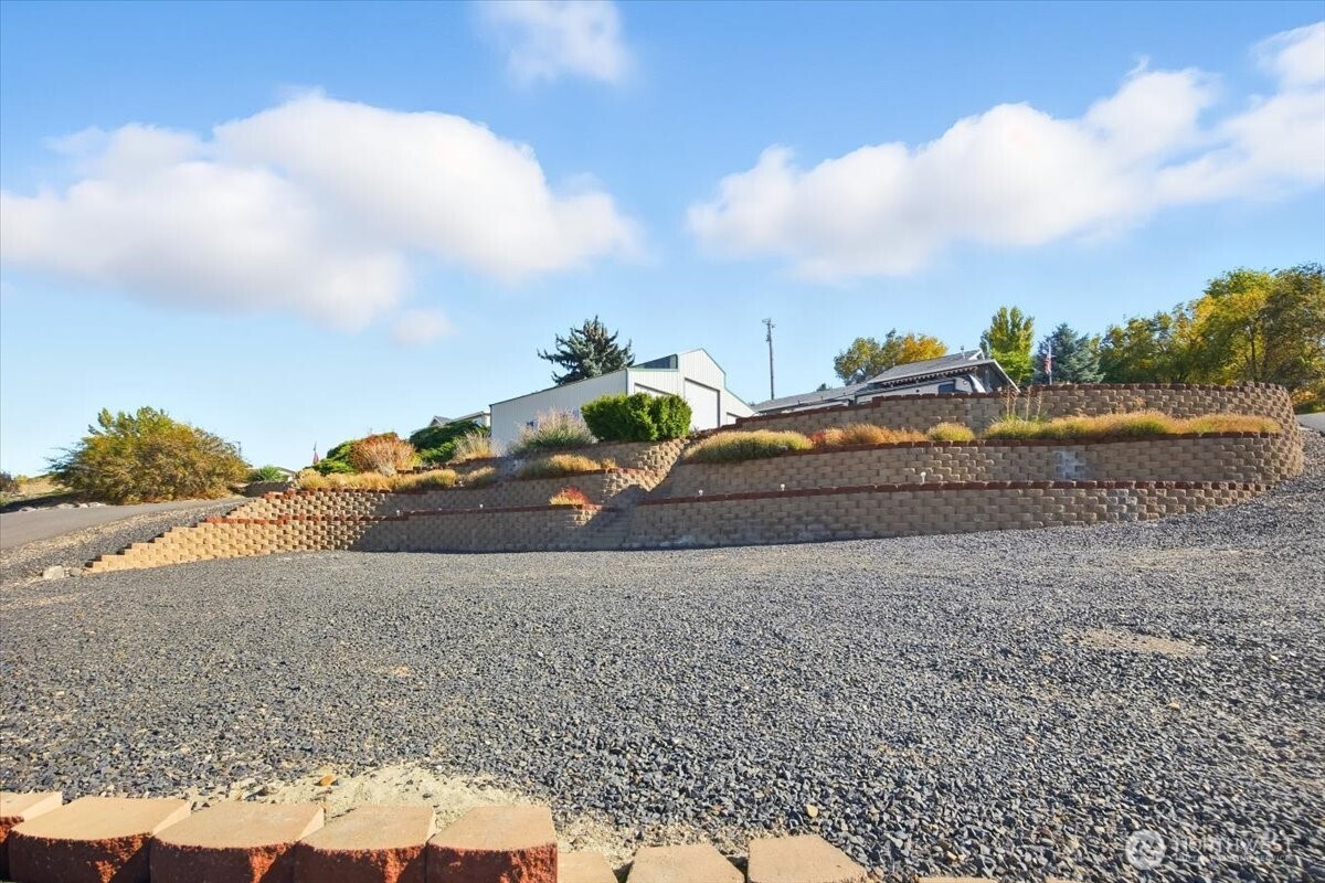 372 Harbor Boulevard Burbank, WA 99323 - Photo 2 of 31 a view of car parked on the side of the road