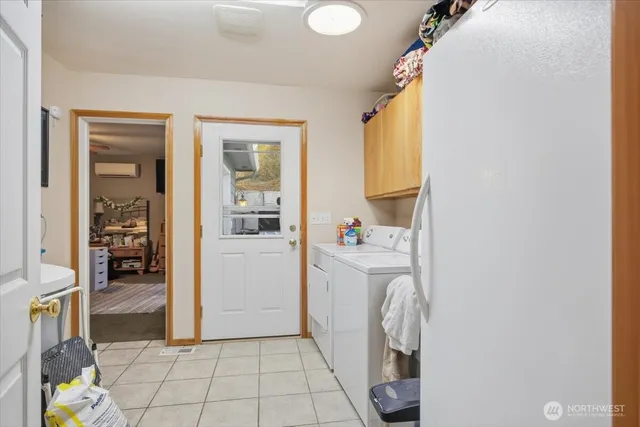 a room with a washer and dryer