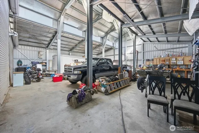 a view of a garage with a lot of stuff