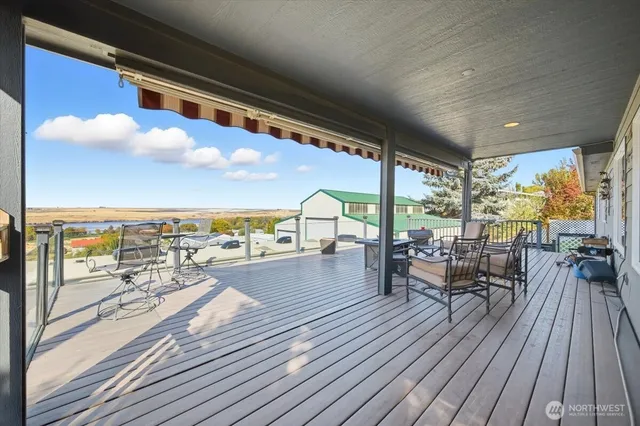a view of a swimming pool with a patio