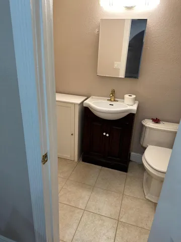 a bathroom with a shower and a toilet