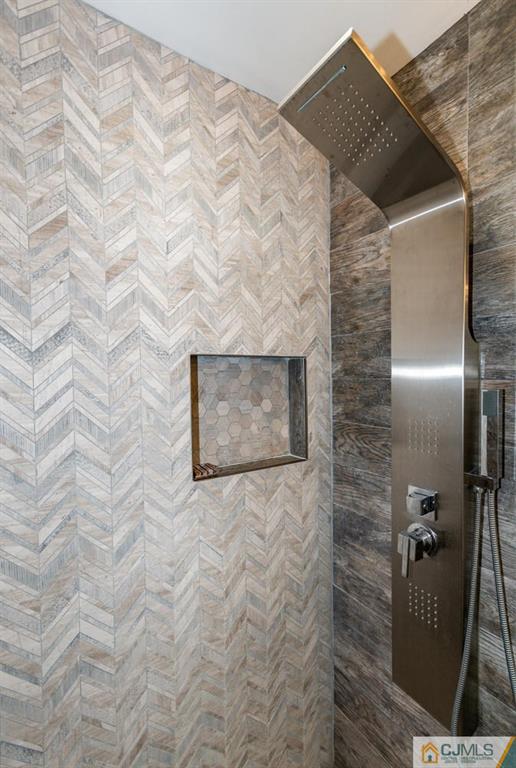 106 Rector Street Perth Amboy, NJ 08861 - Photo 12 of 20 a bathroom with a shower and a sink