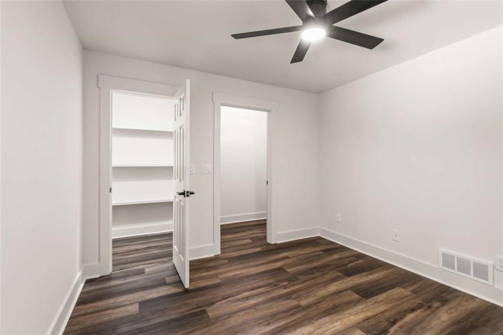 7448 Berea Road Winston, GA 30187 - Photo 15 of 42 a view of empty room with wooden floor
