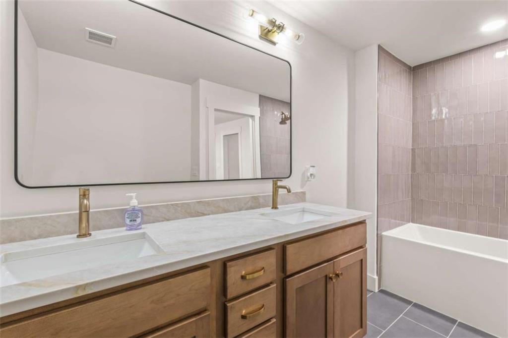 7448 Berea Road Winston, GA 30187 - Photo 17 of 42 a bathroom with a sink and a mirror
