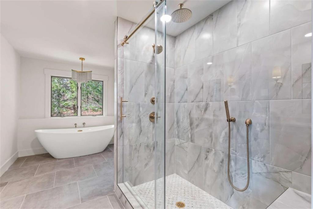 7448 Berea Road Winston, GA 30187 - Photo 22 of 42 a bathroom with a sink bathtub and shower