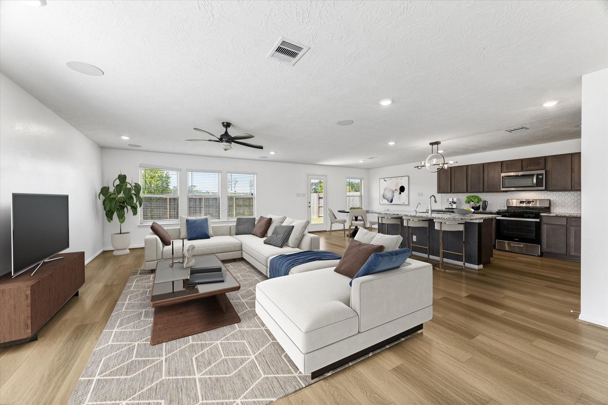 2531 Eden Rdg Way Willis, TX 77378 - Photo 9 of 26 Virtually staged living room. Beautiful space for all of your furnishings.