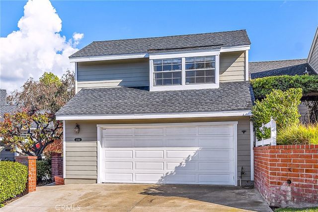 a front view of house with garage