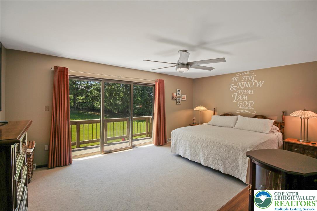 3470 Brodhead Road Bethlehem, PA 18020 - Photo 54 of 84 Sliding glass doors open this spacious primary bedroom to a private outdoor deck.