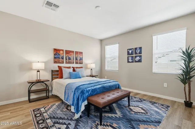 a bed room with a bed and a couch