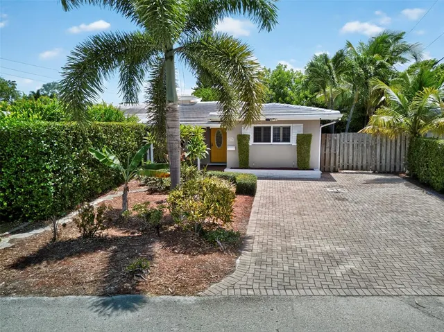 an aerial view of a house with garden